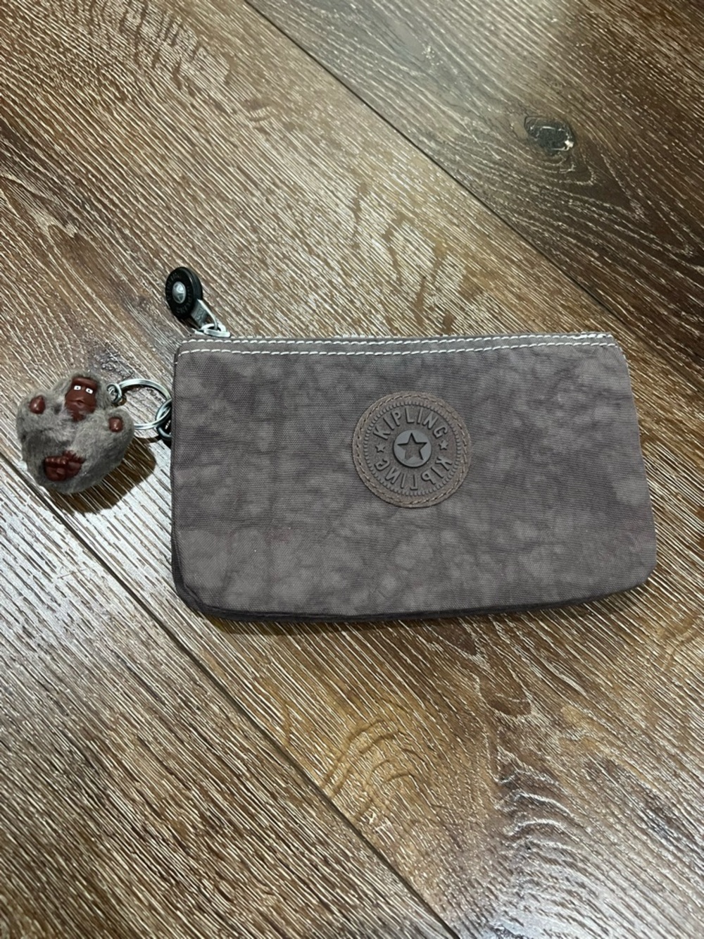 Kipling Taupe-Brown Zip Pouch wallet with Logo Patch